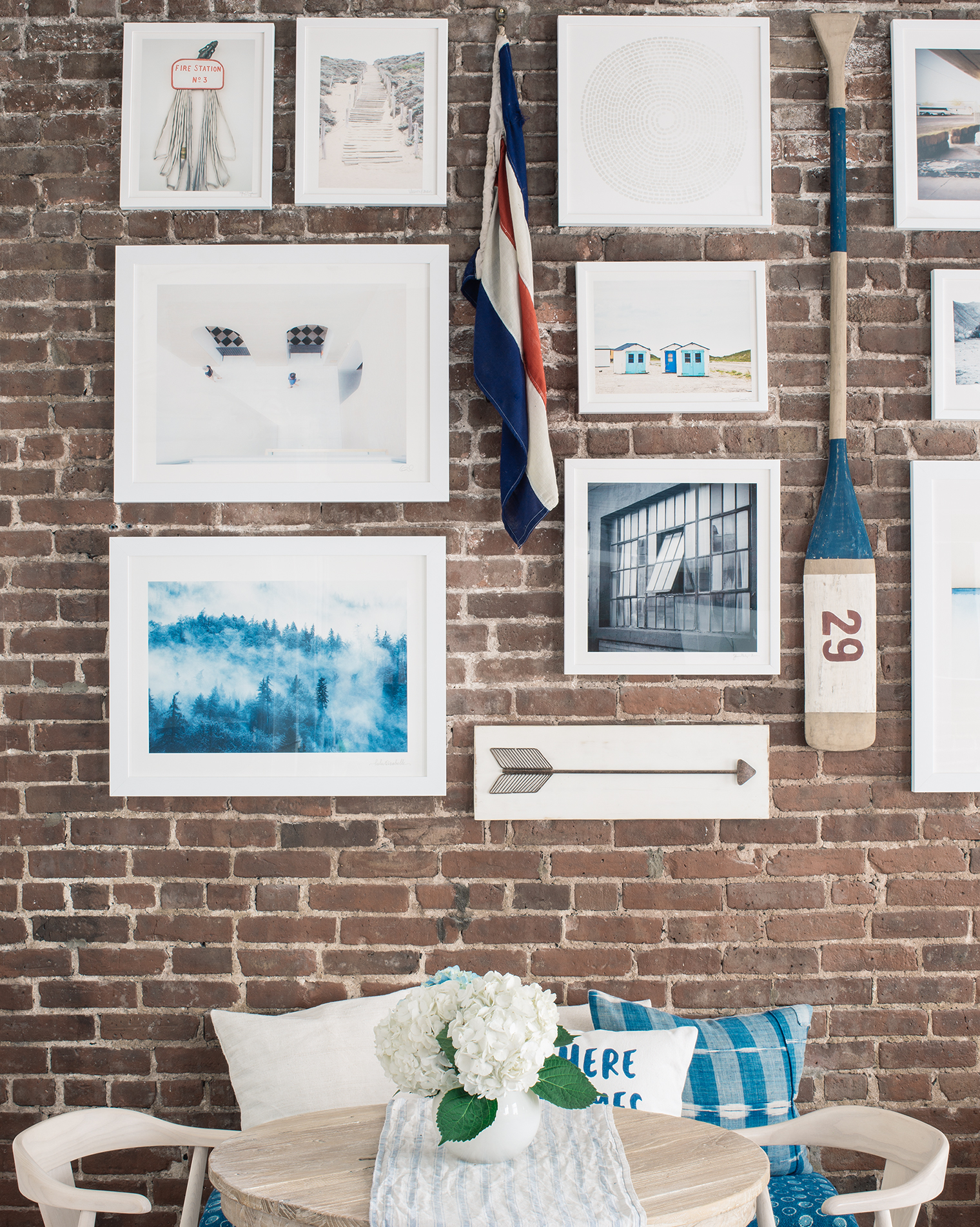 how to hang a gallery wall on exposed brick walls